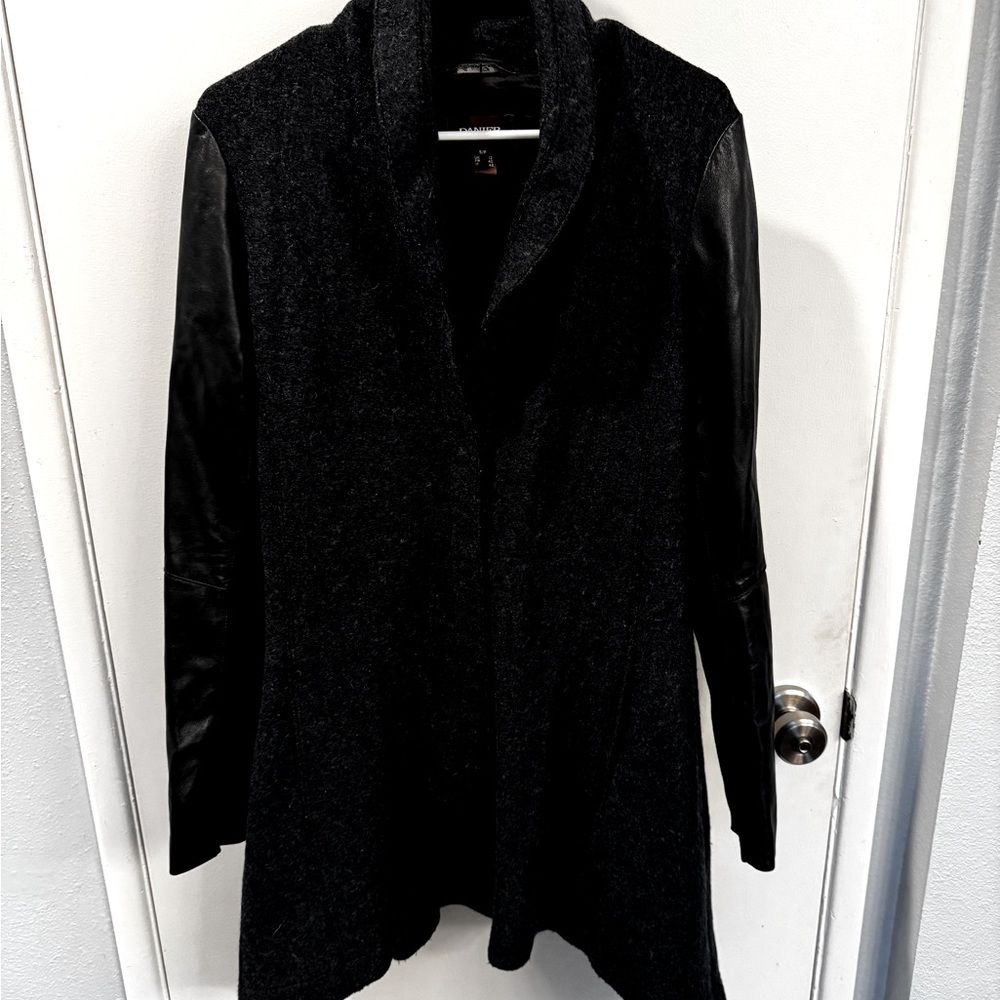 Wool coat with leather sleeves